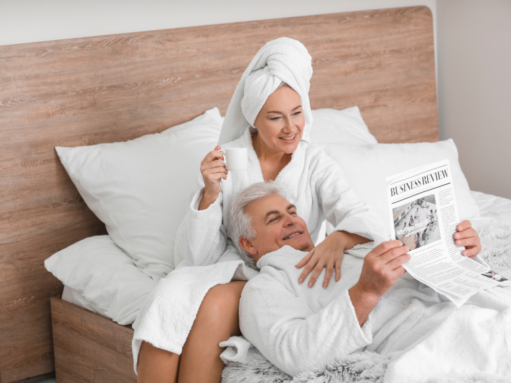ED older couple newspaper in bed